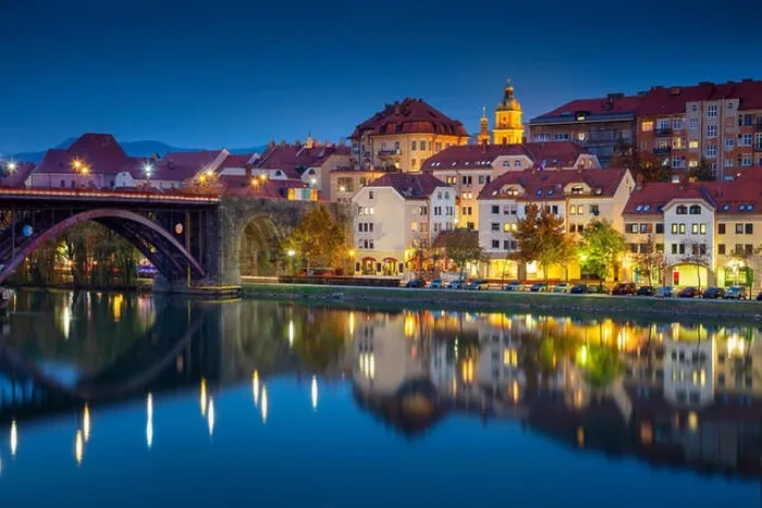 Framed Print : Maribor, Slovenia. Cityscape image of Maribor, Slovenia during autumn twilight blue hour with reflection of the city in Drava River
