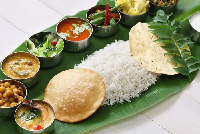 Framed Print : meals served on banana leaf, traditional south indian cuisine Framed Print : meals served on banana leaf, traditional south indian cuisine