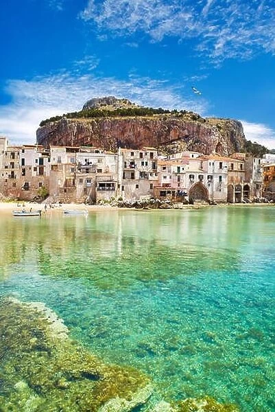 Medieval houses and La Rocca hill, Cefalu old town, Sicily, Italy