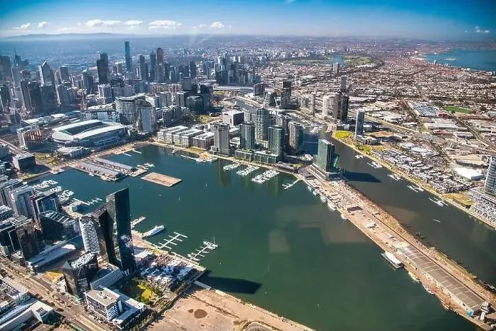Framed Print : MELBOURNE, AUSTRALIA - SEPTEMBER 8, 2018: Aerial city skyline from helicopter. Downtown and Yarra river