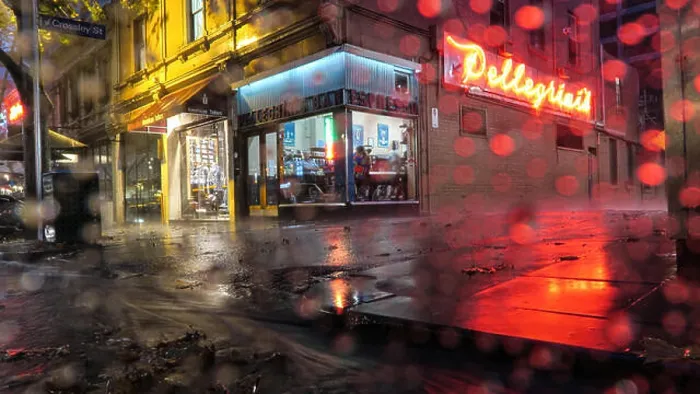 Framed Print : Melbourne scenes : Iconic Melbourne cafe Pellegrini's on a wet wintry night