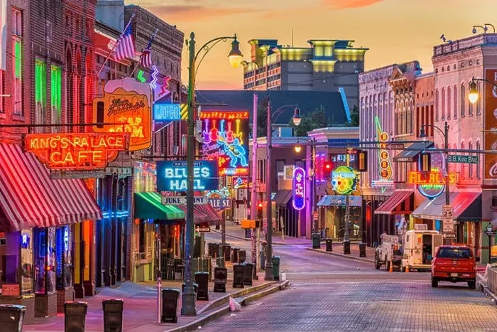 Framed Print : MEMPHIS, TENNESSEE - AUGUST 25, 2017: Blues Clubs on historic Beale Street at twilight Framed Print : MEMPHIS, TENNESSEE - AUGUST 25, 2017: Blues Clubs on historic Beale Street at twilight