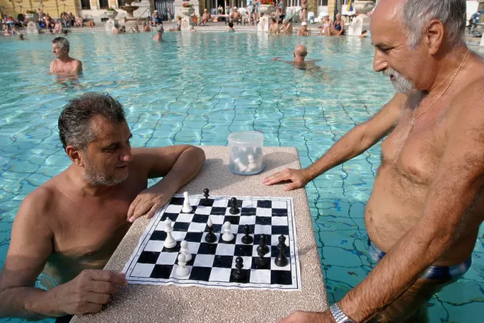 Framed Print : Men playing chess at Szechenyi thermal baths in Budapest Hungary