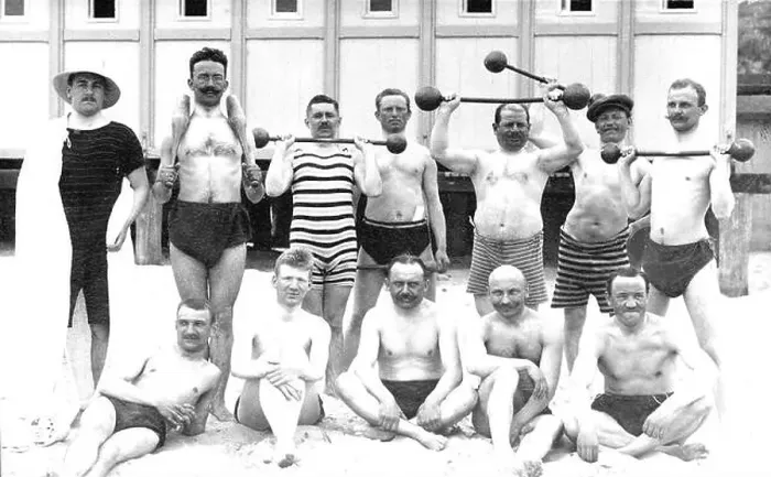 Framed Print : Men's group on the beach with weights, ca. 1929, 1920s, exact place unknown, Germany Framed Print : Men's group on the beach with weights, ca. 1929, 1920s, exact place unknown, Germany