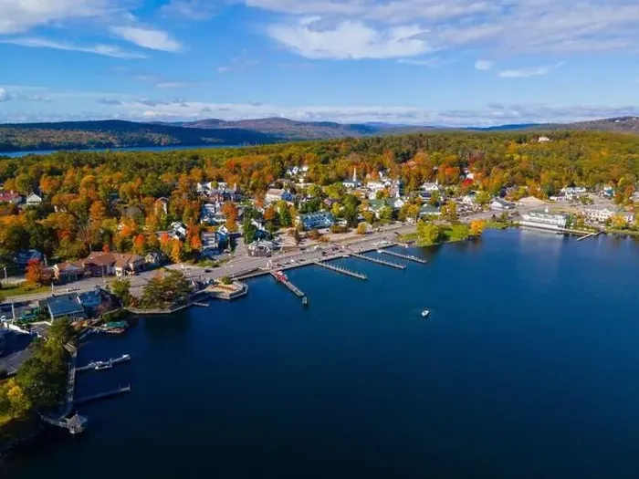 Framed Print : Meredith town center with fall foliage aerial view in fall with Meredith Bay in Lake Winnipesaukee Framed Print : Meredith town center with fall foliage aerial view in fall with Meredith Bay in Lake Winnipesaukee