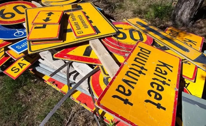 Framed Print : Messy inventory pile of Finnish traffic signs lying on the ground, Finland Framed Print : Messy inventory pile of Finnish traffic signs lying on the ground, Finland