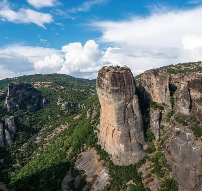 Framed Print : Meteora Greece. Blue sky with clouds over Monastery buildings on top of rocks. Europe travel destination Framed Print : Meteora Greece. Blue sky with clouds over Monastery buildings on top of rocks. Europe travel destination