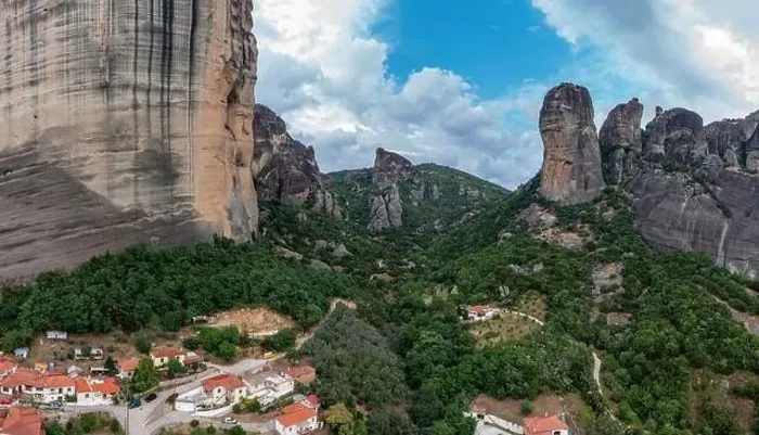 Framed Print : Meteora Greece. Blue sky with clouds over Monastery buildings on top of rocks and Kalambaka town and valley Framed Print : Meteora Greece. Blue sky with clouds over Monastery buildings on top of rocks and Kalambaka town and valley