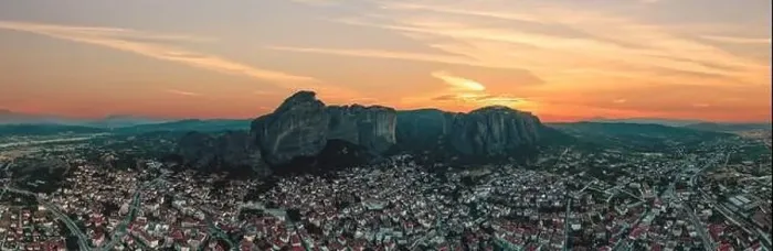 Framed Print : Meteora Greece panorama. Sunset and orange sky over Kalabaka town. Rock formations landscape, Europe travel destination Framed Print : Meteora Greece panorama. Sunset and orange sky over Kalabaka town. Rock formations landscape, Europe travel destination