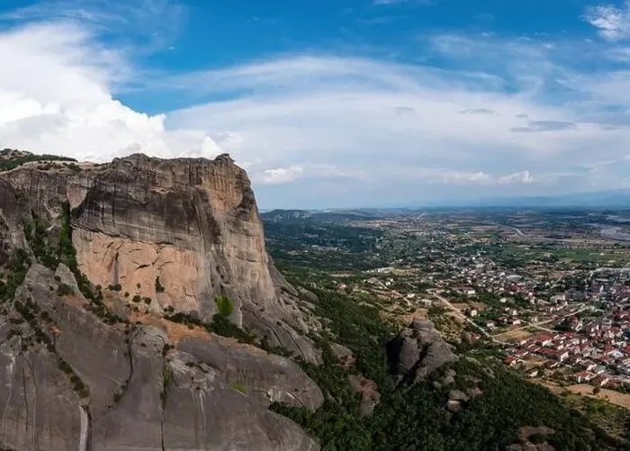 Framed Print : Meteora Greece at sunrise, Blue sky with clouds over Monastery buildings on top of rocks and Kalambaka town and valley Framed Print : Meteora Greece at sunrise, Blue sky with clouds over Monastery buildings on top of rocks and Kalambaka town and valley