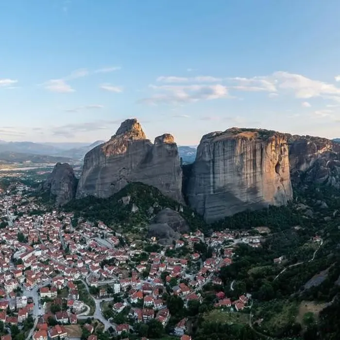 Framed Print : Meteora Greece at sunrise, Blue sky with clouds over Monastery buildings on top of rocks and Kalambaka town and valley Framed Print : Meteora Greece at sunrise, Blue sky with clouds over Monastery buildings on top of rocks and Kalambaka town and valley