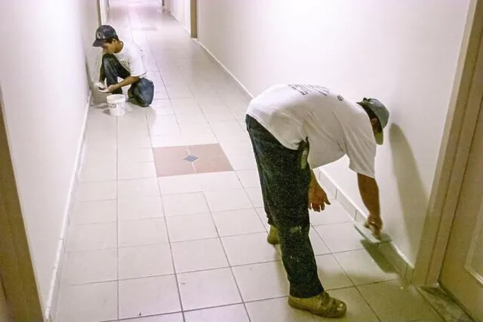 Framed Print : Miami Beach Florida, Hispanic man installer installing new tile inside interior condominium condo residential apartment Framed Print : Miami Beach Florida, Hispanic man installer installing new tile inside interior condominium condo residential apartment