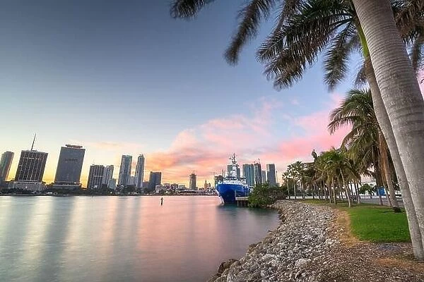 Miami, Florida city skyline on Biscayne Bay at dusk