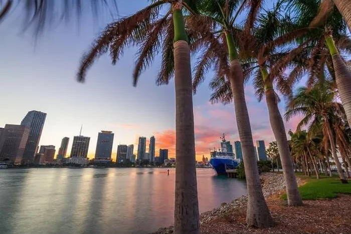 Framed Print : Miami, Florida, USA skyline on Biscayne Bay with palms at dusk Framed Print : Miami, Florida, USA skyline on Biscayne Bay with palms at dusk