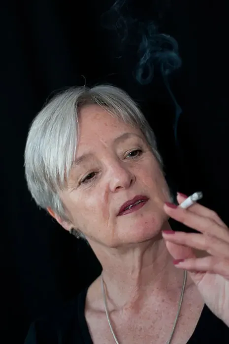 Framed Print : Middle aged woman smoking a cigarette Framed Print : Middle aged woman smoking a cigarette