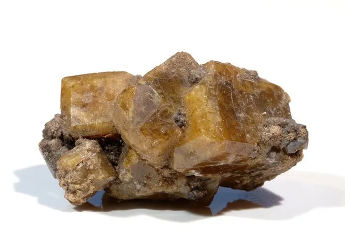 Framed Print : Mineral Vesuvianite, Four interlocking oblong crystals Amber-brown colour, Lake Jaco, Chihuahua, Mexico Framed Print : Mineral Vesuvianite, Four interlocking oblong crystals Amber-brown colour, Lake Jaco, Chihuahua, Mexico