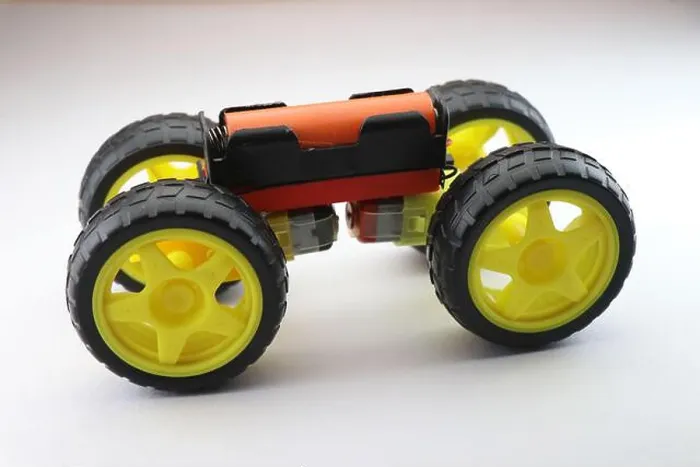Framed Print : Mini Electric car working model made from hobby wheels, dc motor and rechargeable battery as a science activity Framed Print : Mini Electric car working model made from hobby wheels, dc motor and rechargeable battery as a science activity