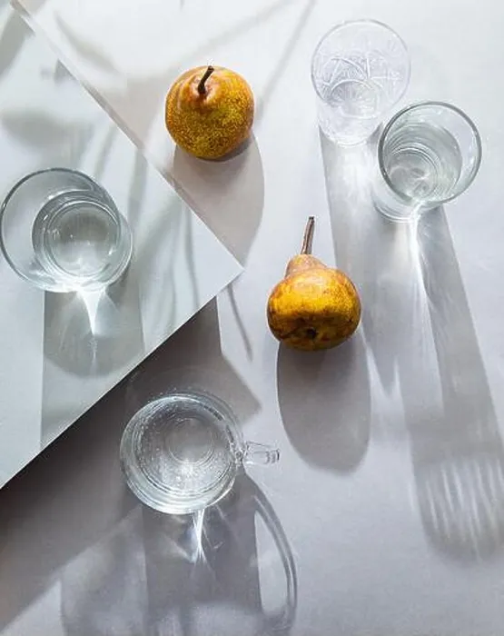 Framed Print : Minimalistic still life of pears and glasses of water top view. Summer composition light and shadow on a gray table Framed Print : Minimalistic still life of pears and glasses of water top view. Summer composition light and shadow on a gray table