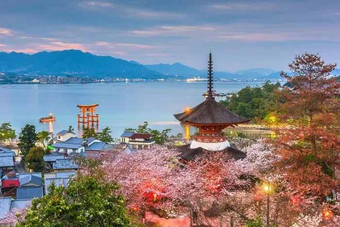 Framed Print : Miyajima Island, Hiroshima, Japan with temples on the Seto Inland Sea at dusk in the spring season Framed Print : Miyajima Island, Hiroshima, Japan with temples on the Seto Inland Sea at dusk in the spring season