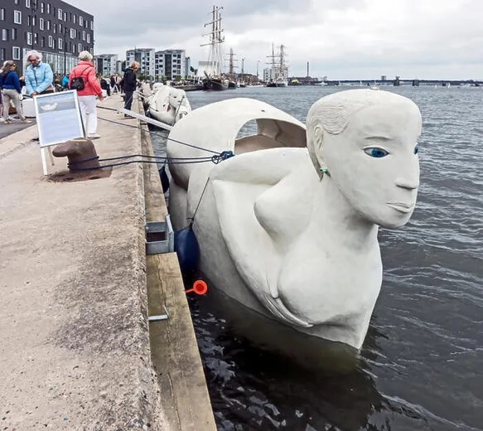 Framed Print : Mobile sculptures made of concrete called Life-Boats by Norwegian Marit Benthe Norheim moored in the Harbour Aalborg Framed Print : Mobile sculptures made of concrete called Life-Boats by Norwegian Marit Benthe Norheim moored in the Harbour Aalborg