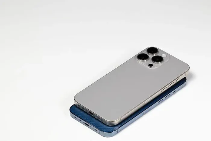 Framed Print : mockup smartphone or Mobile phone with triple camera on back isolated on white background Framed Print : mockup smartphone or Mobile phone with triple camera on back isolated on white background