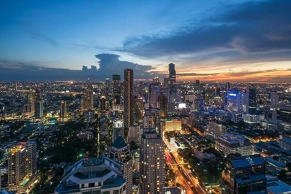 Modern building in Bangkok business district at Bangkok city with skyline at twilight, Thailand