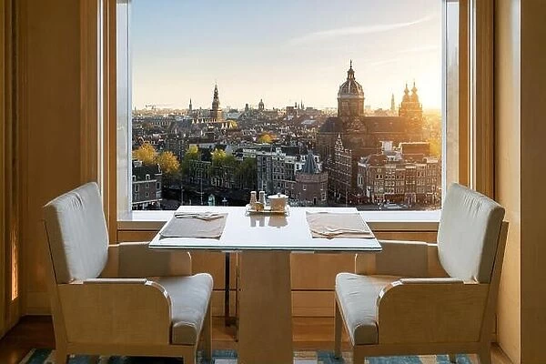 Modern luxury restaurant interior with romantic sence Amsterdam old town view in Amsterdam, Netherlands