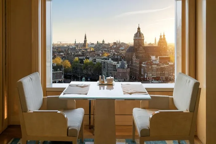 Framed Print : Modern luxury restaurant interior with romantic sence Amsterdam old town view in Amsterdam, Netherlands Framed Print : Modern luxury restaurant interior with romantic sence Amsterdam old town view in Amsterdam, Netherlands