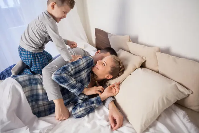 Framed Print : mom dad and young son in the bedroom after sleeping House Framed Print : mom dad and young son in the bedroom after sleeping House