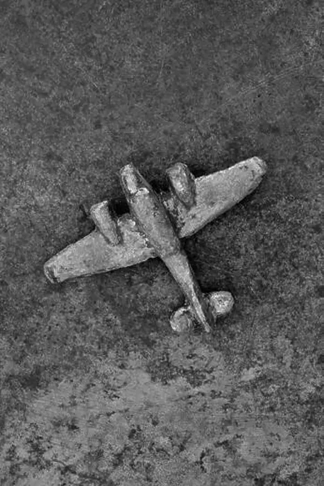 Framed Print : Monochrome image of vintage lead model airplane on tarnished metal Framed Print : Monochrome image of vintage lead model airplane on tarnished metal