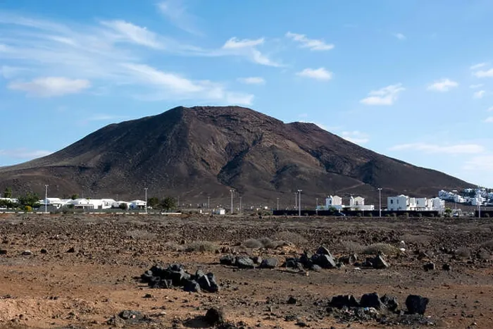 Framed Print : Montana Roja seen from Faro Park, Playa Blanca, Lanzarote, Canary Islands, Spain Framed Print : Montana Roja seen from Faro Park, Playa Blanca, Lanzarote, Canary Islands, Spain