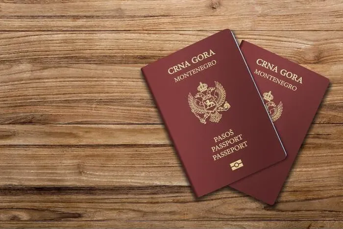 Framed Print : The Montenegrin passport is the primary document of international travel issued by Montenegro