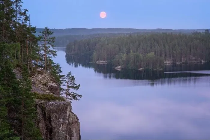 Framed Print : Mood moonlight landscape with calm forest and lake at summer night in Finland Framed Print : Mood moonlight landscape with calm forest and lake at summer night in Finland
