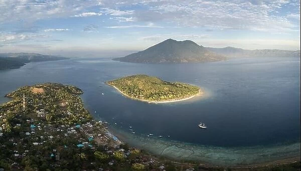 Morning light shines on islands in the middle of Pantar Strait, between Alor and Pantar in Indonesia. This beautiful region has high biodiversity