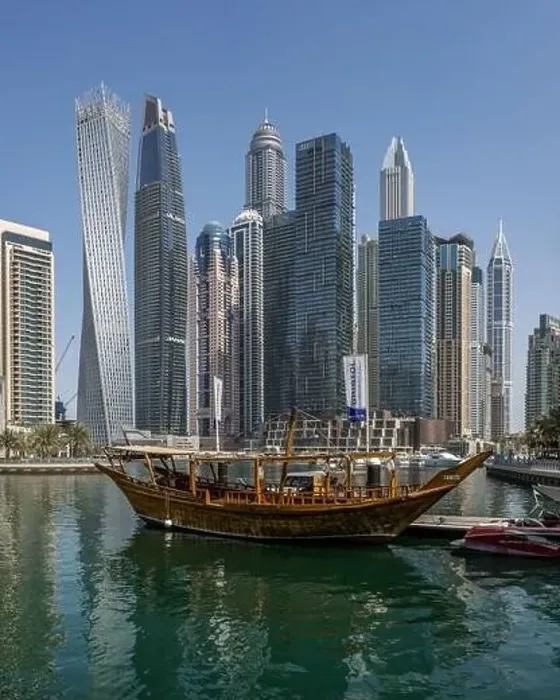 Framed Print : Morning shot of the Dubai Marina skyline along with a docked boat Framed Print : Morning shot of the Dubai Marina skyline along with a docked boat