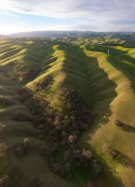 Morning sunlight shines on green hills in the scenic Tri-Valley region of Northern California, just east of San Francisco Bay