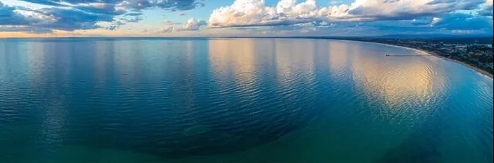 Framed Print : Mornington Peninsula coastline and Port Phillip Bay at sunset with beautiful cloud reflections - wide aerial panorama Framed Print : Mornington Peninsula coastline and Port Phillip Bay at sunset with beautiful cloud reflections - wide aerial panorama