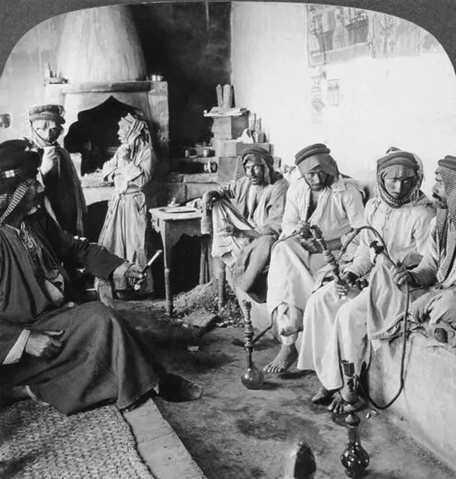 Framed Print : Mosul, Iraq: c. 1900 Arab men at their leisure in a coffee house in Mosul Framed Print : Mosul, Iraq: c. 1900 Arab men at their leisure in a coffee house in Mosul