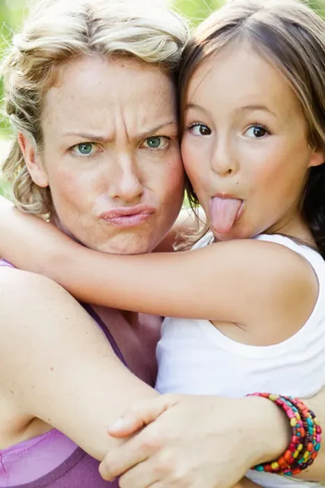 Framed Print : mother and daughter making faces