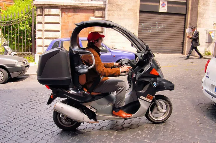 Framed Print : motorbike / moped with roof top, Rome, Italy Framed Print : motorbike / moped with roof top, Rome, Italy