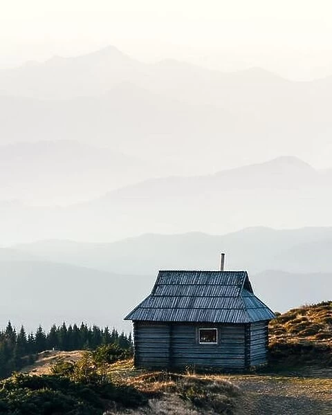 Mountain cabin during sunrise