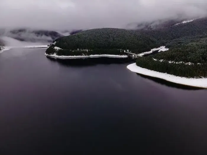 Framed Print : Mountain lake photography in winter season, shot from a drone Framed Print : Mountain lake photography in winter season, shot from a drone