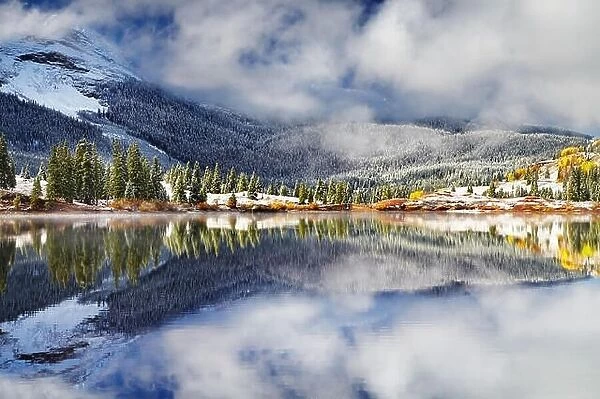 Mountain lake after the snow storm. Molas Lake, San Juan Mountains, Colorado, USA