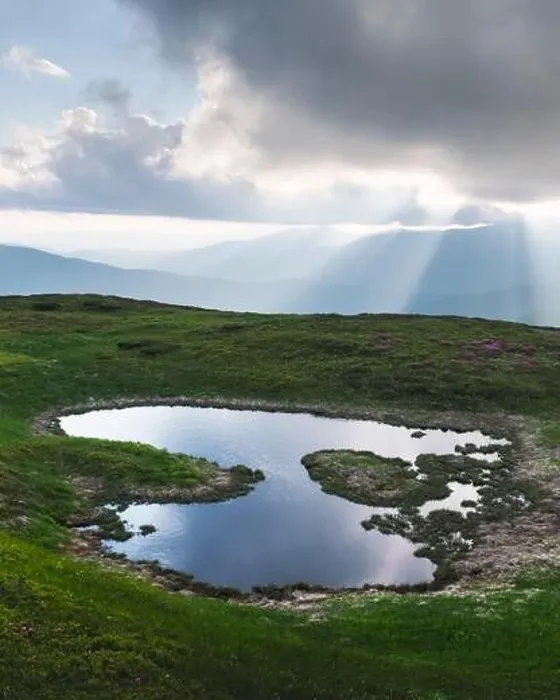 Framed Print : Mountain lake on sunrise time. Picturesque summer landscape with green mountain hills and sun rays in morning sky. Carpathian mountains Framed Print : Mountain lake on sunrise time. Picturesque summer landscape with green mountain hills and sun rays in morning sky. Carpathian mountains
