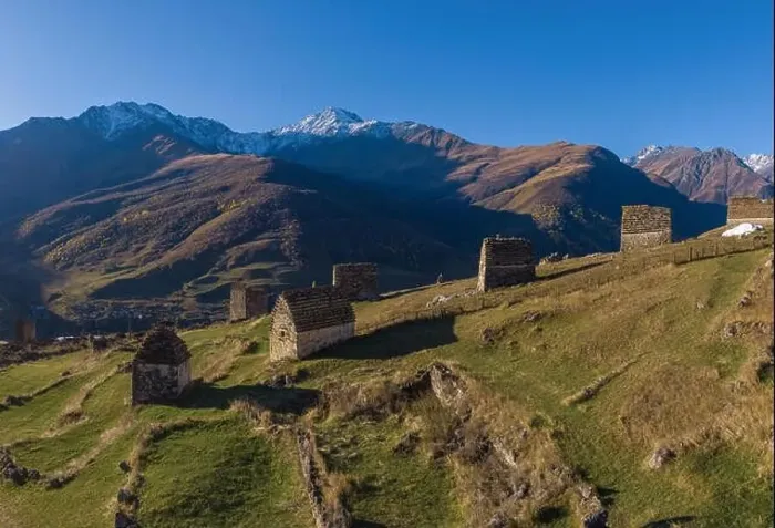 Framed Print : Mountain landscape and medieval architecture of North Ossetia. Shot on a drone Framed Print : Mountain landscape and medieval architecture of North Ossetia. Shot on a drone