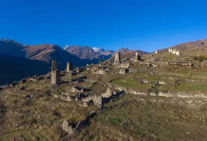 Framed Print : Mountain landscape and medieval architecture of North Ossetia. Shot on a drone Framed Print : Mountain landscape and medieval architecture of North Ossetia. Shot on a drone