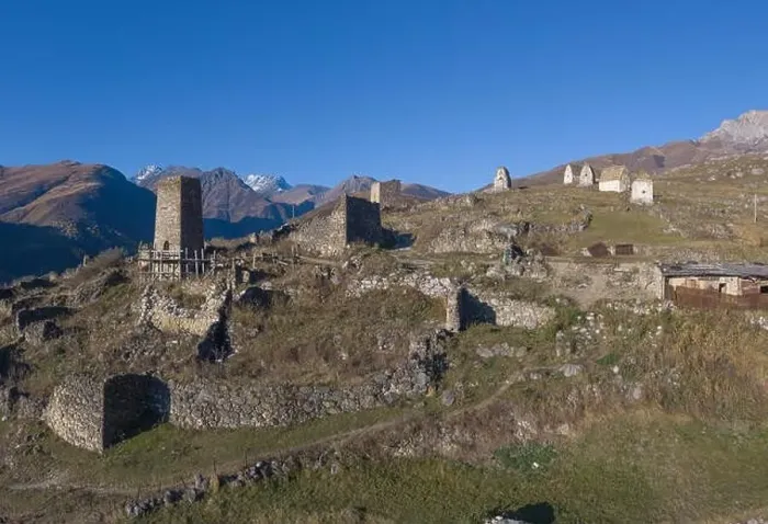 Framed Print : Mountain landscape and medieval architecture of North Ossetia. Shot on a drone Framed Print : Mountain landscape and medieval architecture of North Ossetia. Shot on a drone