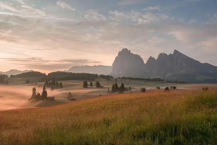 Framed Print : Mountain meadows of the Dolomites in the morning fog and mist with ethereal atmosphere Framed Print : Mountain meadows of the Dolomites in the morning fog and mist with ethereal atmosphere