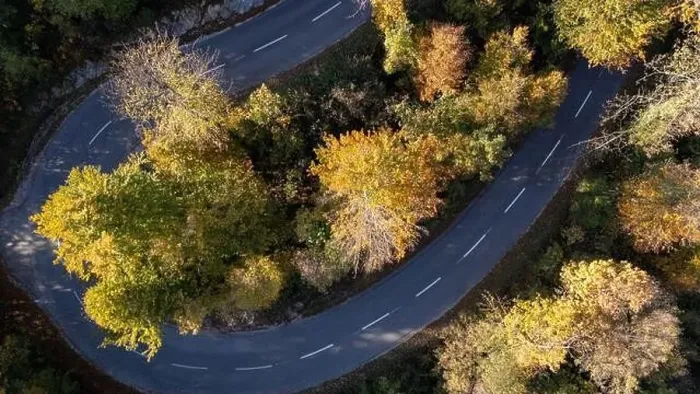 Framed Print : Mountain road surrounded by fall season forest. Aerial photography Framed Print : Mountain road surrounded by fall season forest. Aerial photography