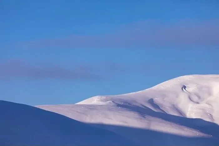 Framed Print : Mountain winter landscape. Colored dawn over the snow-capped mountains. Drone view Framed Print : Mountain winter landscape. Colored dawn over the snow-capped mountains. Drone view